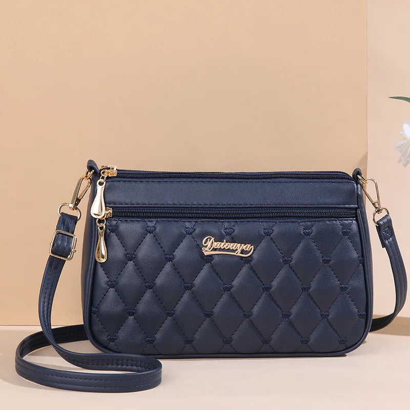 Lily™ - Bolsa Messenger Bordada