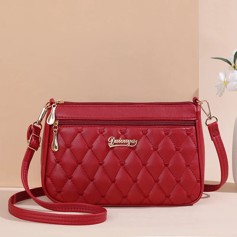 Lily™ - Bolsa Messenger Bordada